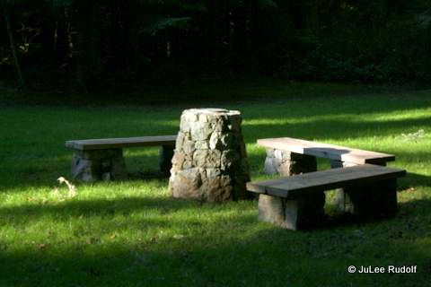Benches surrounding sun dial at Sharpe Park